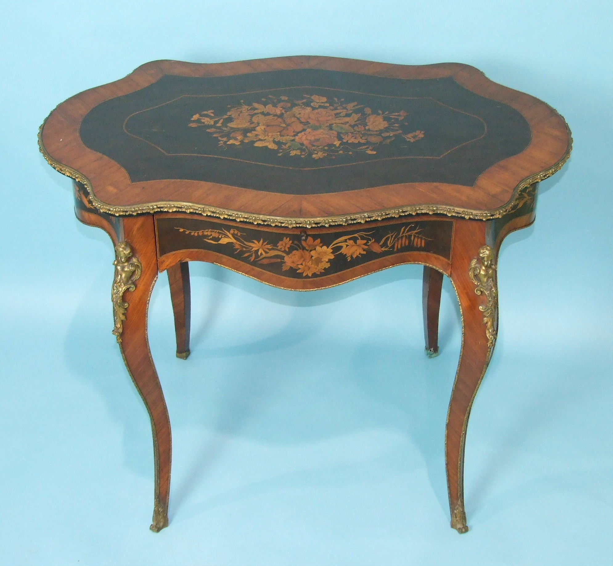 A good quality 19th century French kingwood and ebony marquetry centre table.