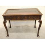 A 20th century mahogany display table, the glazed top with blind fret frieze on cabriole legs, 105