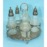 A late-George-III oval silver cruet stand by R & S Hennell, the reeded frame to hold five bottles