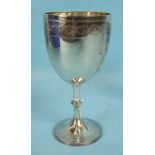 A Victorian silver trophy cup of goblet form with knopped, maker CB, London 1876, engraved "First