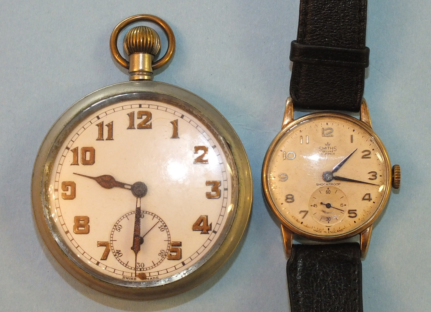 A gents Smiths de Luxe 9ct-gold-cased wrist watch with Arabic numerals and seconds subsidiary, B R