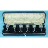 A cased set of six miniature spirit cups of plain goblet form, maker Mappin & Webb, each 6cm high,