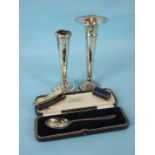 A cased christening spoon, Sheffield 1925, a silver spill vase, marks rubbed and other items.