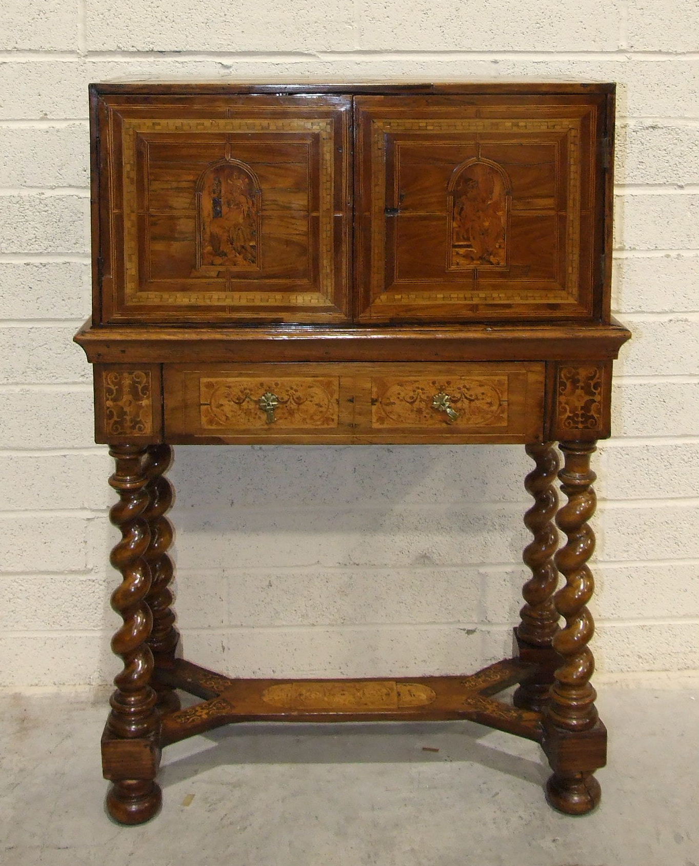 A mainly 18th-century-style Continental table cabinet with overall marquetry and parquetry inlay,