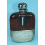A silver and half crocodile skin covered hip flask, maker James Dixon & Sons, Sheffield 1923, 13cm.