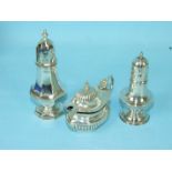 A silver pepper of baluster form, London 1900, another, similar and a gadrooned silver mustard