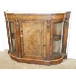 A Victorian walnut and marquetry side cabinet, the central panelled door flanked by a pair of