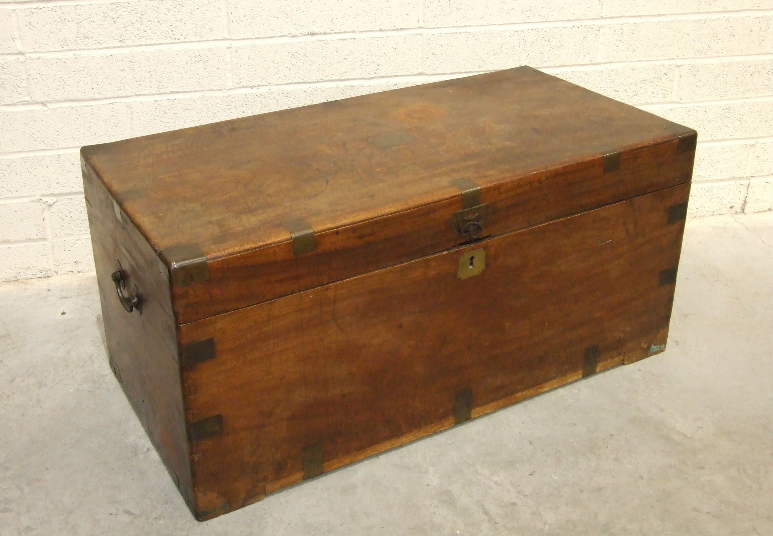 A Victorian teak brass-bound blanket chest with intermediate and corner bindings, 104cm wide, 49cm