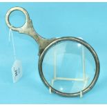 A silver-mounted magnifying glass by G & S Co. Ltd, London 1909, 21cm long, (a/f).