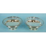A pair of plain circular footed dishes with pierced borders, 18cm diameter, 7.5cm high, Sheffield