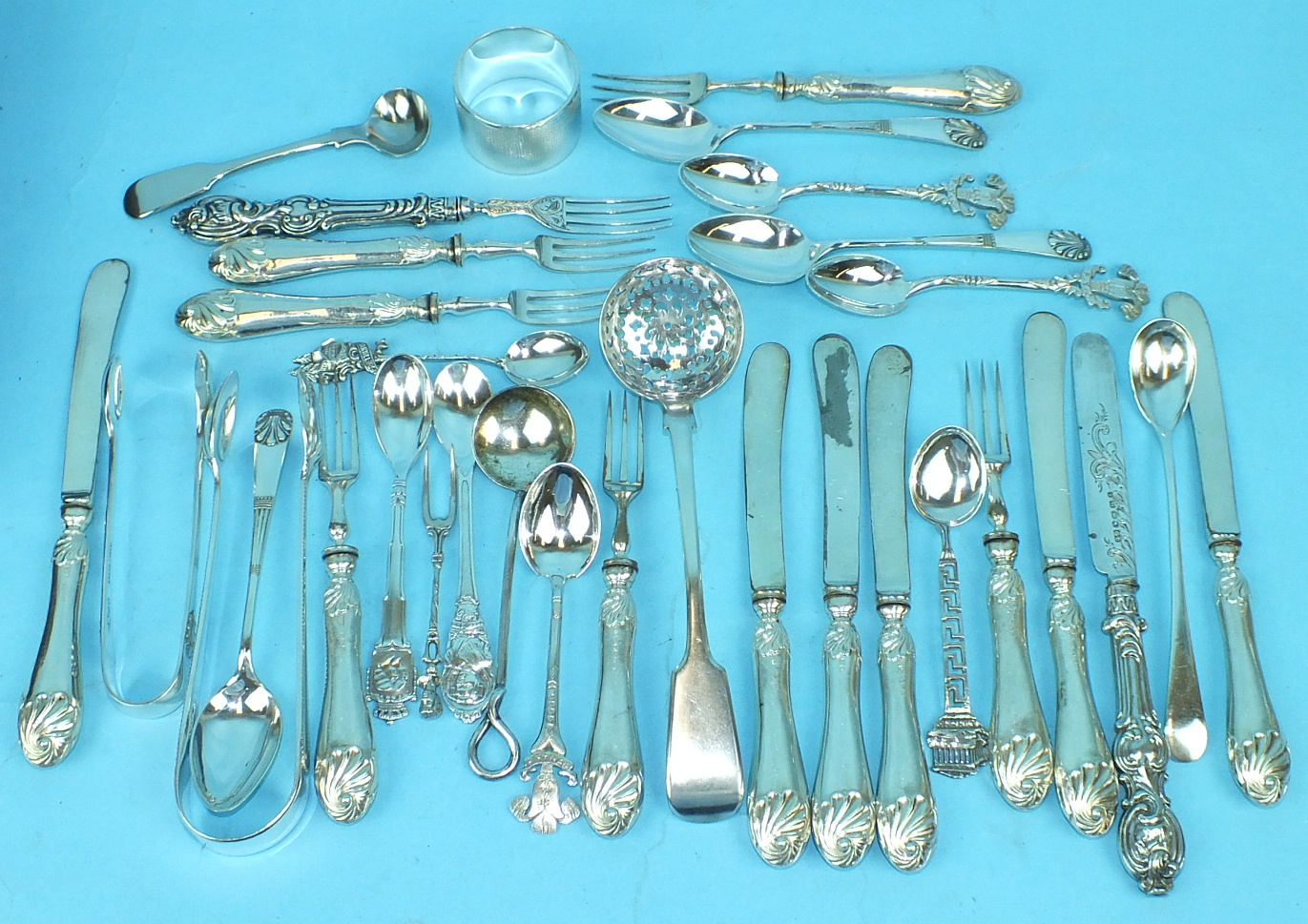 A set of six each silver-handled dessert eaters and other plated items.