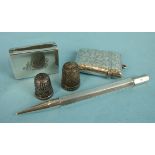 A silver Vesta case with engraved leaf decoration, Birmingham 1924, a silver matchbox case (a/f),