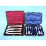 A cased set of six trefid teaspoons and tongs, Sheffield 1911 WEIGHT and a cased set of six silver