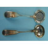 A fiddle pattern sifter spoon, London 1864 and a Scottish sifter spoon, Edinburgh 1810, (2).