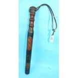 A Victorian police truncheon with crowned VR cypher and red shield with three diagonal lines within,