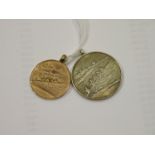 A 9ct gold rowing medallion for the WEARA Senior Championship 1935, 7g and a similar silver