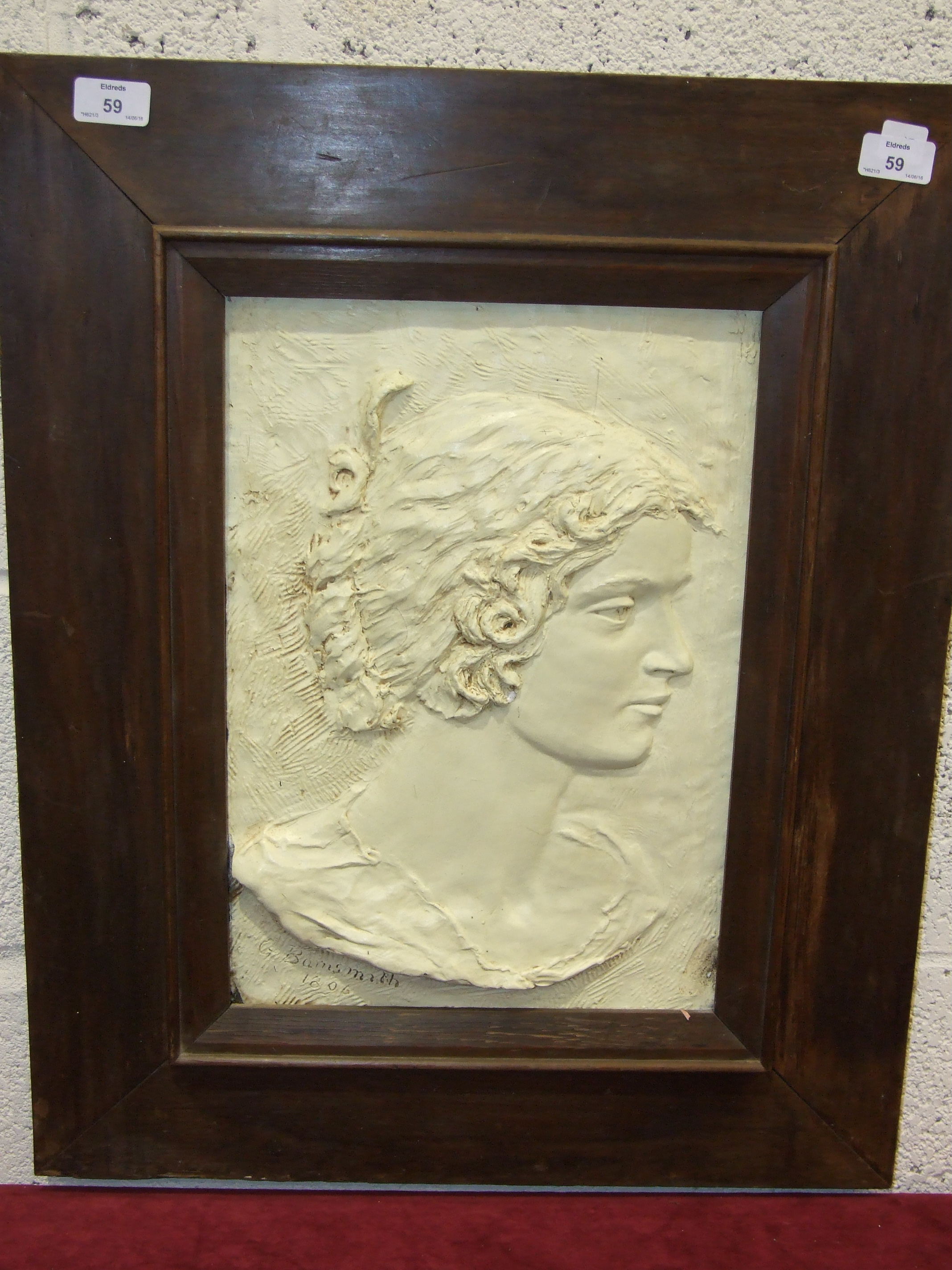 G Barnsmith, a bronzed plaster plaque bust of a young woman, signed and dated, 1806, 39.5 x 28cm.