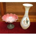 A pink satin glass tazza with wavy rim, on plated stand, 23.5cm diameter, 17cm high and a yellow