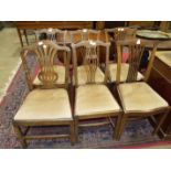 A Harlequin set of six stained wood dining chairs with pierced splats and drop-in seats and a