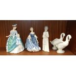 Two Royal Doulton figurines, 'Linda' HN3374, 22cm, 'Hilary' HN2335, 20cm, two Nao figures of ducks