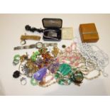 A quantity of costume jewellery in a modern jewellery case.