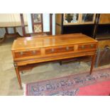 A 19th century square piano case converted as a sideboard and fitted with three drawers, on square