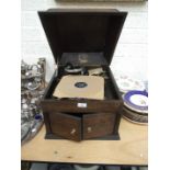 An HMV model oak table-top gramophone with No.4 sound box, 34cm high, 39cm wide and a small quantity