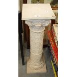 A composite pedestal with carved column, 74cm high.