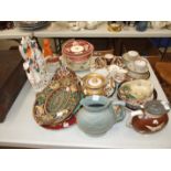 A majolica oval dish stamped 'H S & S', (damaged), two salt-glazed jugs with moulded decoration of