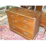 A 19th century stained wood rectangular chest of two short and two long drawers, on plinth base (