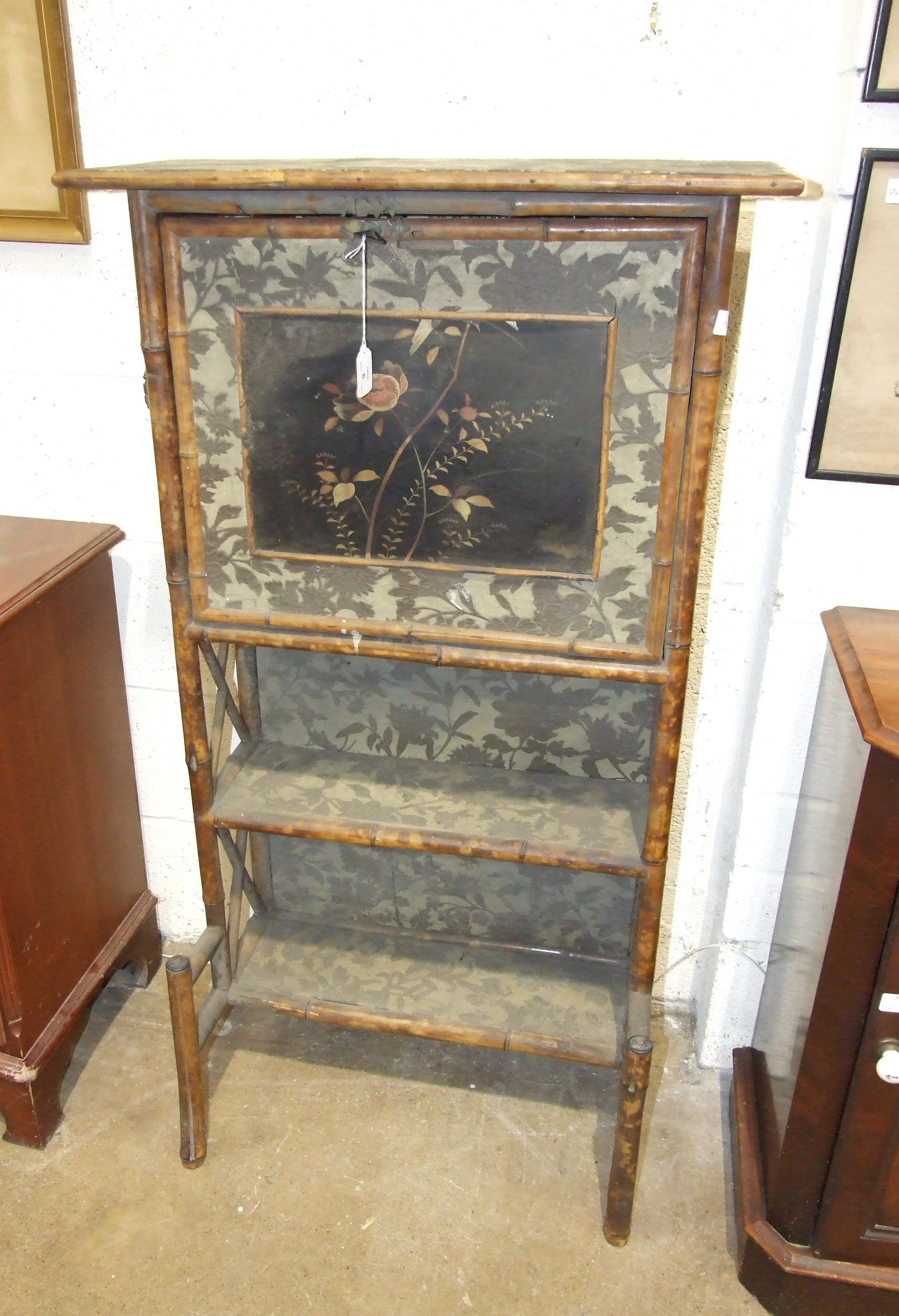 A late-Victorian bamboo-framed bureau/shelves, the rectangular top above a fall front, with
