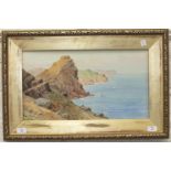 Lewis Mortimer, 'Castle Rock on the North Devon Coast', a signed watercolour, 28 x 51cm.