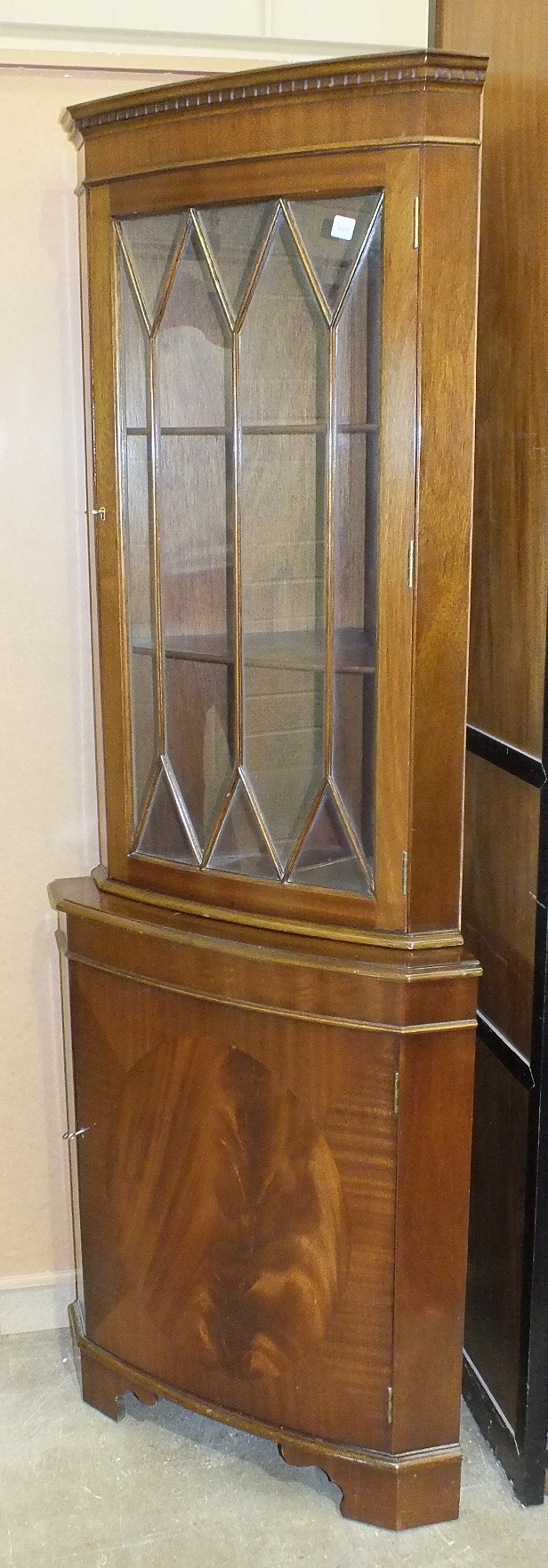 A modern mahogany finish bureau, the fall front above two drawers, on reeded legs, 74.5cm wide and a - Image 2 of 2