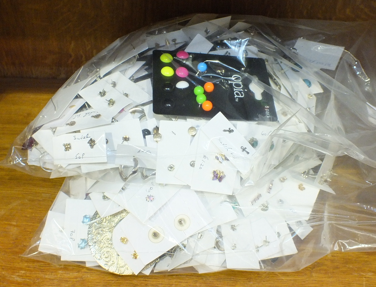 A very large quantity of earrings and ear studs, in excess of 300 pairs.