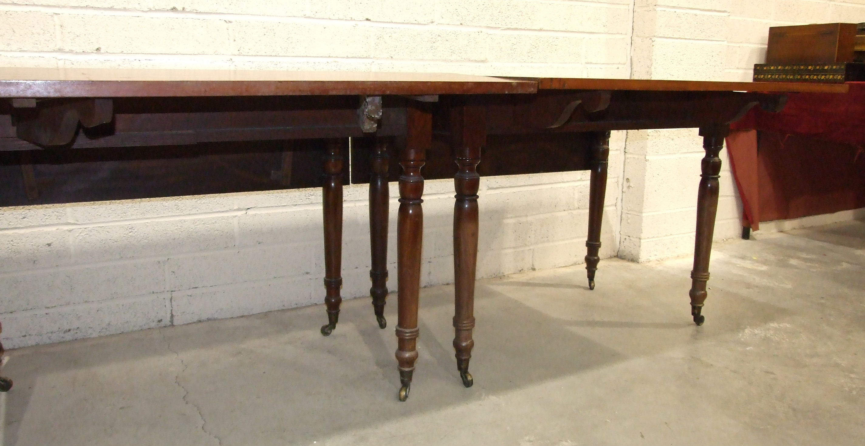 Three 19th century mahogany drop-leaf tables on turned legs, forming a dining table, each section - Image 2 of 2