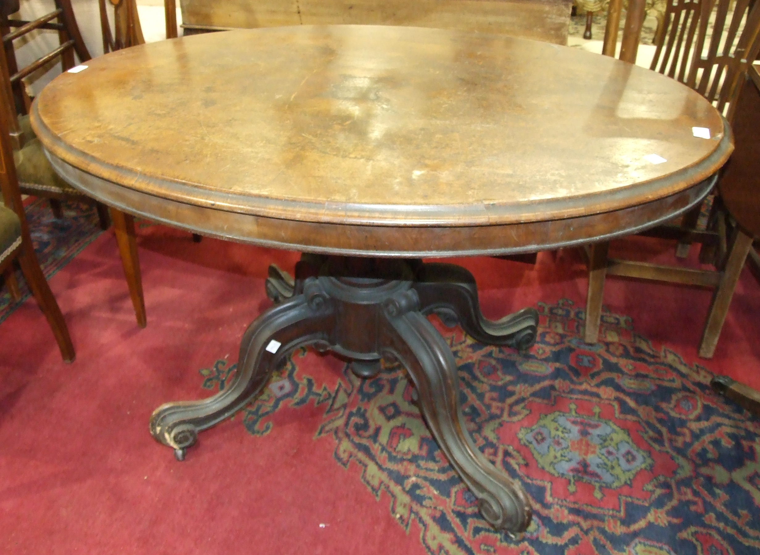 A Victorian walnut oval loo table on quadruped support, 88 x 120cm, (a/f). - Image 2 of 3