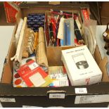 Two artist's wooden easels and a quantity of artist's materials, including brushes, pencils, gouache