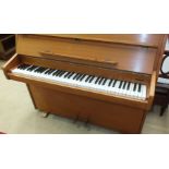 A late-20th century teak and metal frame overstrung upright piano stamped '53397', 114cm wide.