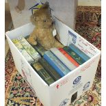 An unmarked plush mohair teddy bear, 40cm and a quantity of books.