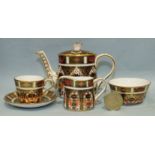 A Royal Crown Derby Old Imari pattern no.1128 miniature teapot, 8cm high, milk jug, sugar bowl,