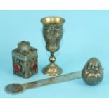 A Russian silver gilt spirit cup with overall engraved decoration, 10cm high, a white metal letter