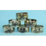 A set of six Asian white metal napkin rings with niello-work decoration, ___3½oz.