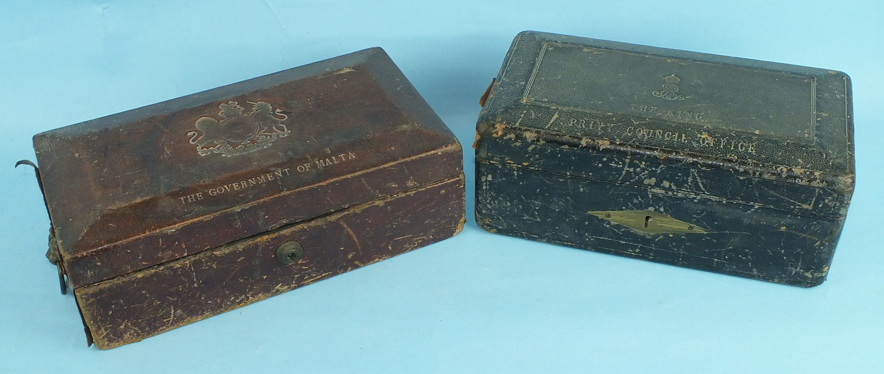 A leather-covered Privy Council Office document box, the tooled leather hinged lid with royal cipher