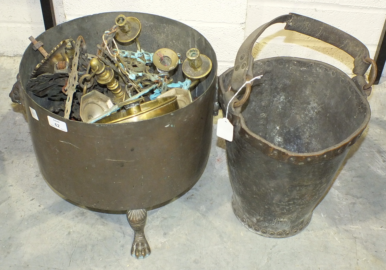 A 19th century copper-bound leather fire bucket (in poor condition), a copper coal bucket on three