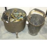 A 19th century copper-bound leather fire bucket (in poor condition), a copper coal bucket on three