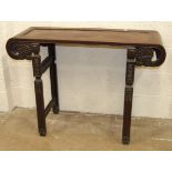 A Chinese hardwood altar table, 116cm wide, 85cm high.