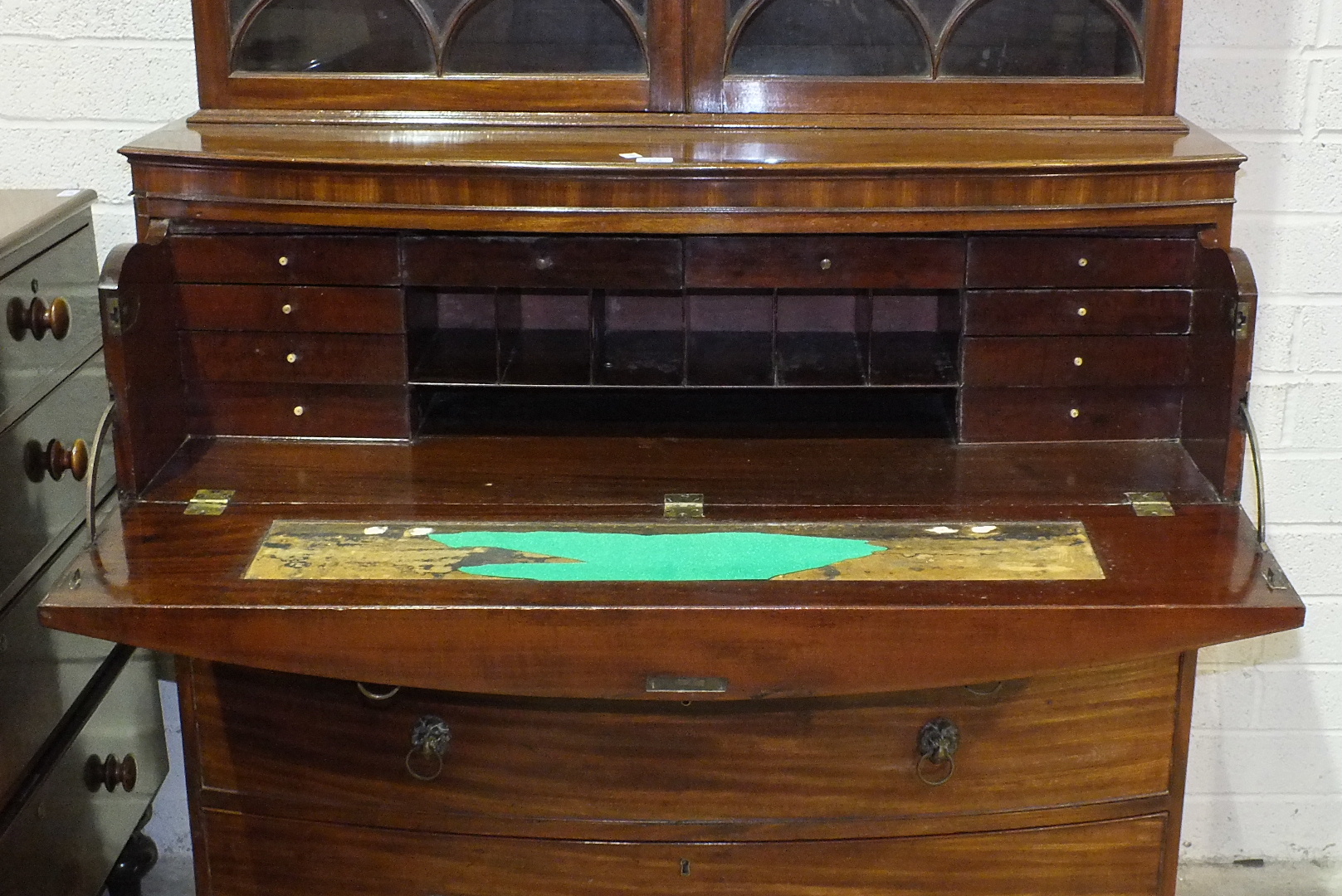 A George III mahogany bow-fronted secretaire bookcase, the moulded cornice above a pair of gothic - Image 2 of 2