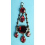 A Georgian gold and garnet pendant c1800 set throughout with foil-backed garnets in individual