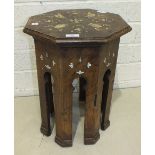 An Oriental walnut octagonal small table inlaid with white metal lines and ivory detail, 48cm