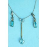 An Edwardian two-stone blue topaz pendant on fine 9ct gold trace chain, (no clasp, two paste drops